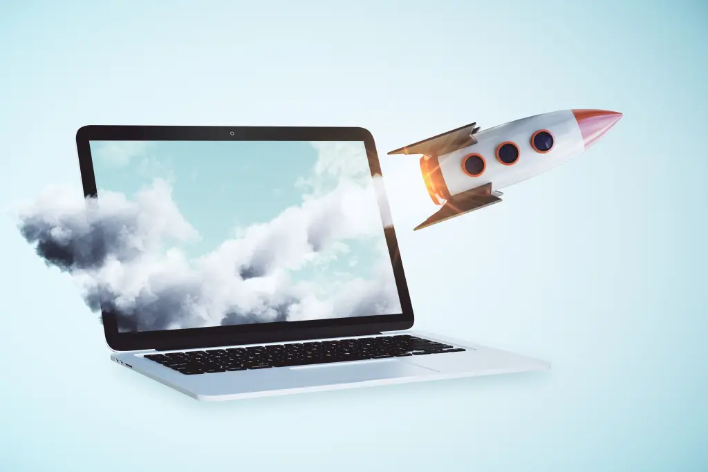 Rocket Ship Flying Out of Laptop